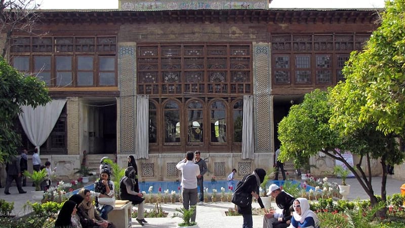 zinat al molok house iranian garden with wooden wndows in shiraz